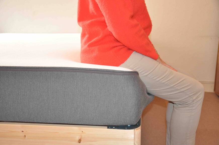 assis sur le matelas casper